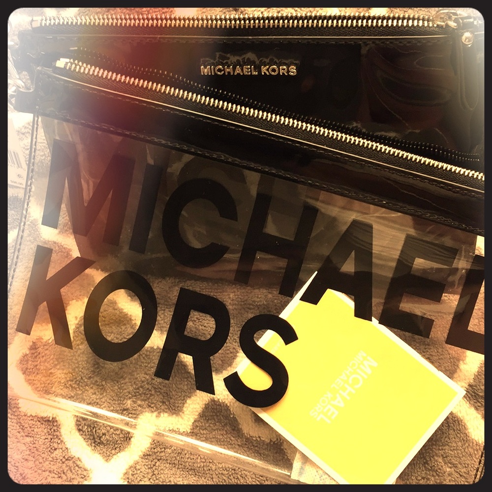 Micheal Kors pouches & clutches
